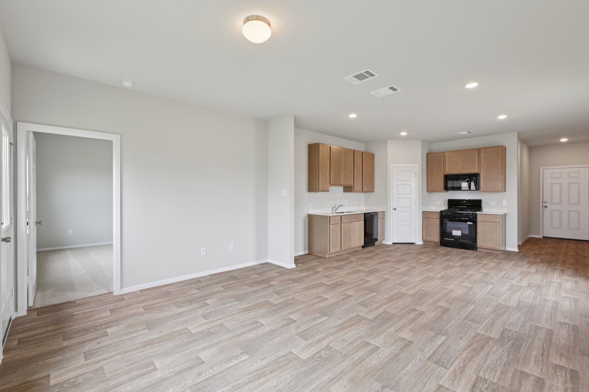 127 Tempest Trail Maxwell, TX 78656 - Photo 5 of 29 a view of kitchen with refrigerator and window