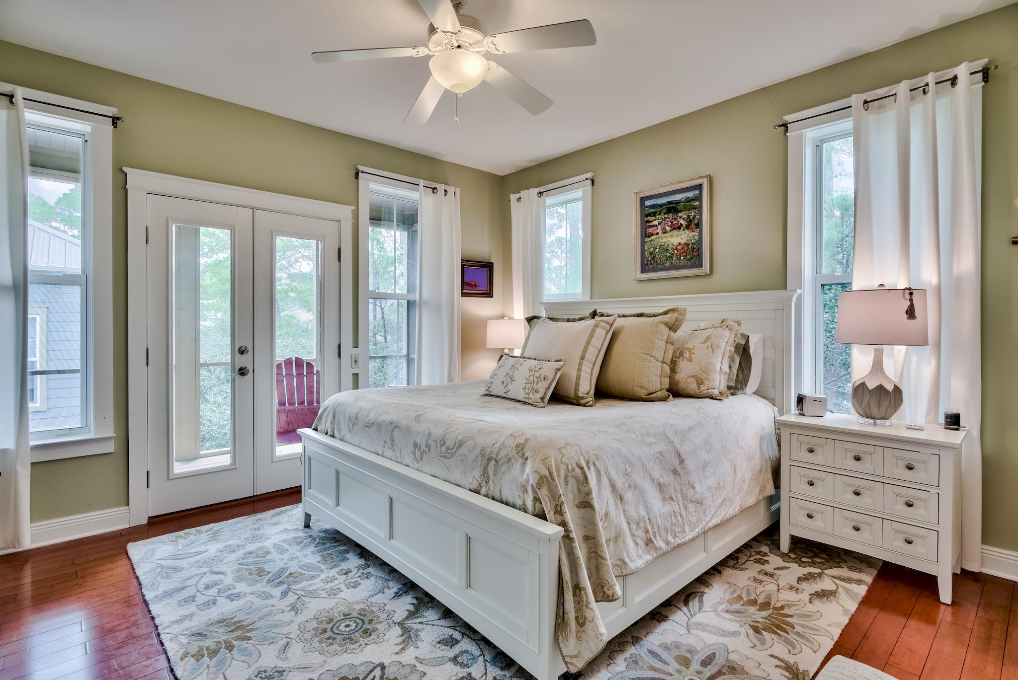 160 North Andalusia Avenue Santa Rosa Beach, FL 32459 - Photo 21 of 61 a bedroom with a large bed and a window