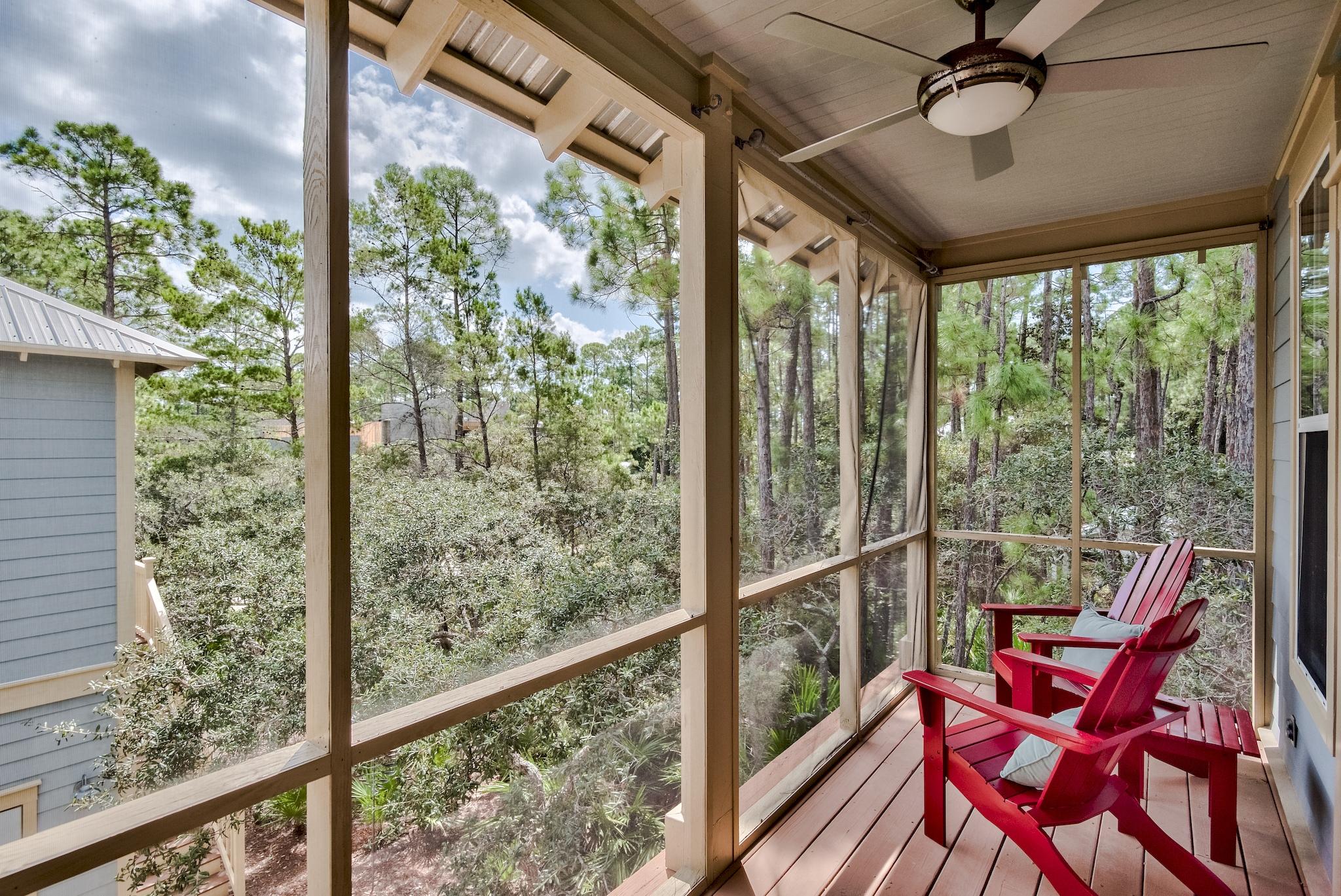 160 North Andalusia Avenue Santa Rosa Beach, FL 32459 - Photo 23 of 61 a view of a porch with furniture and a yard