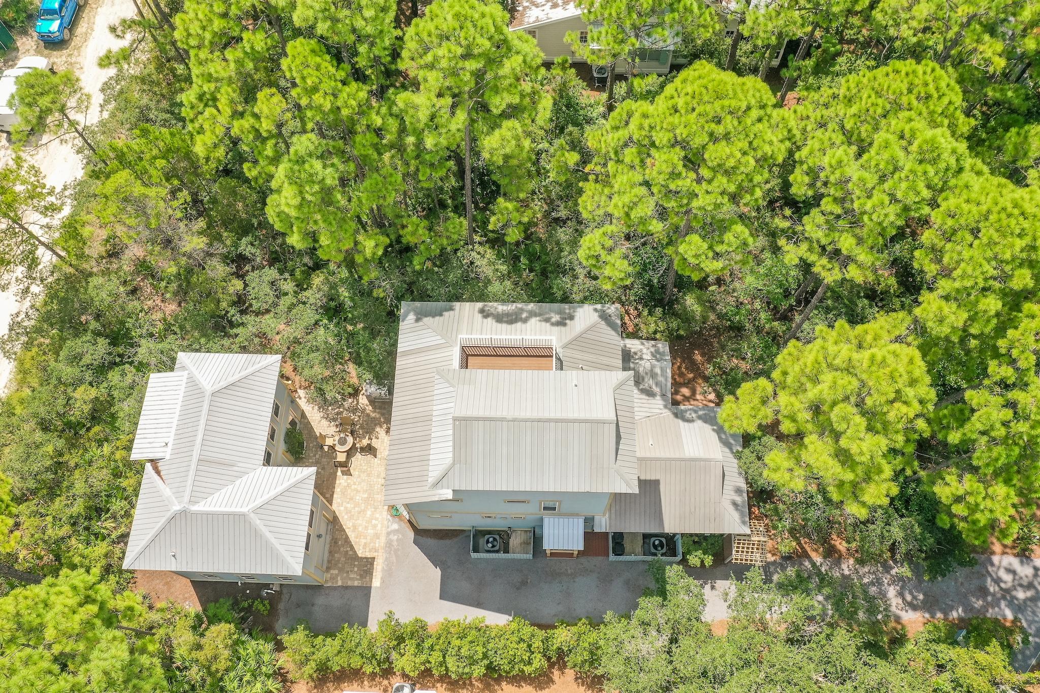 160 North Andalusia Avenue Santa Rosa Beach, FL 32459 - Photo 53 of 61 an aerial view of a house with large trees