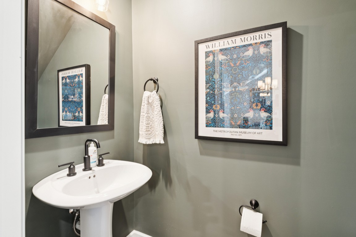 152 Bess Boulevard Spring Hill, TN 37174 - Photo 12 of 25 a bathroom with a sink and a mirror