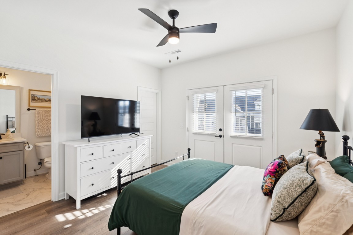 152 Bess Boulevard Spring Hill, TN 37174 - Photo 13 of 25 a bedroom with a bed and a flat screen tv