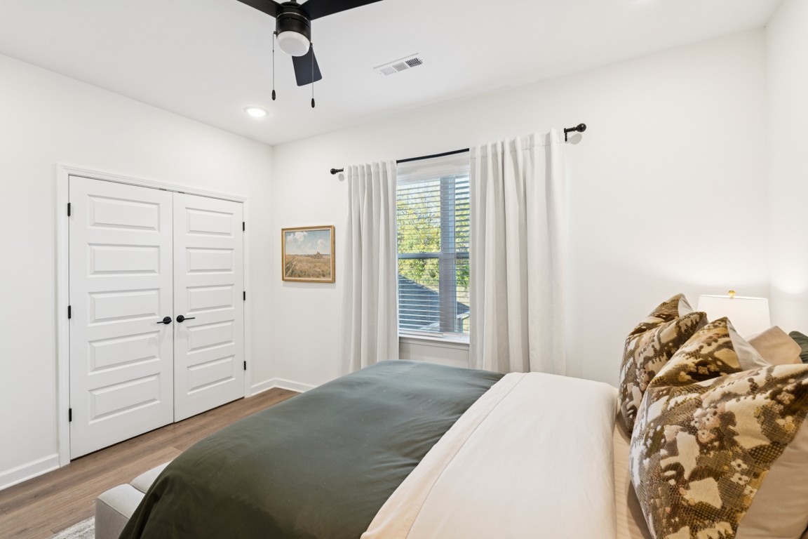 152 Bess Boulevard Spring Hill, TN 37174 - Photo 18 of 25 a bedroom with a bed and a window