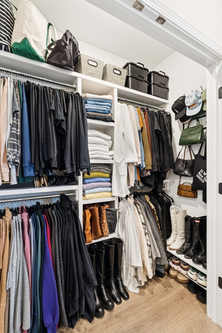 152 Bess Boulevard Spring Hill, TN 37174 - Photo 21 of 25 a view of walk in closet with clothes and shoes
