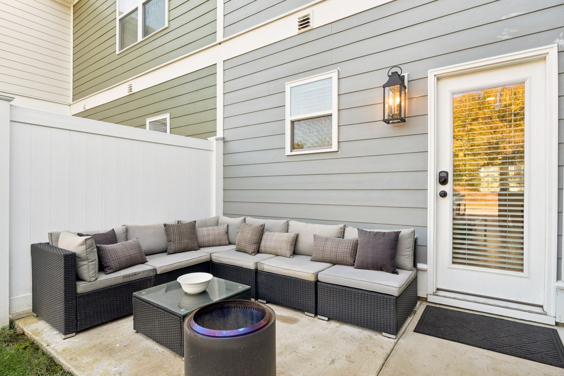 152 Bess Boulevard Spring Hill, TN 37174 - Photo 24 of 25 a building outdoor space with patio furniture and windows