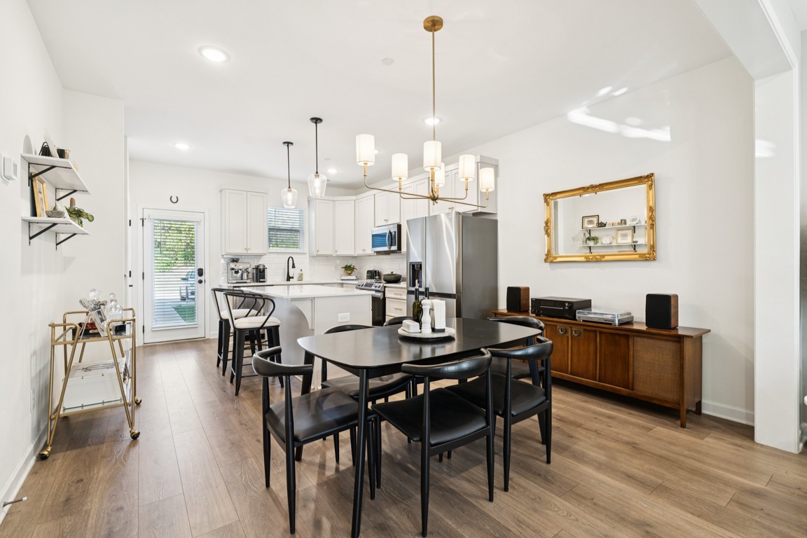 152 Bess Boulevard Spring Hill, TN 37174 - Photo 5 of 25 a large kitchen with a table and chairs