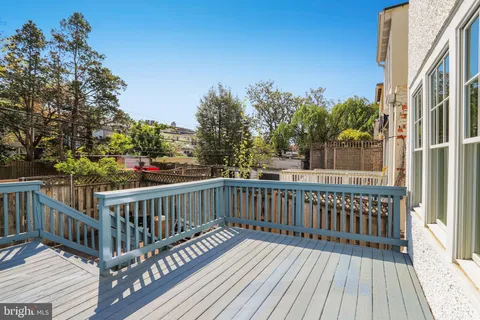a view of a wooden roof deck