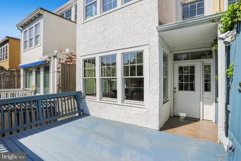 a view of a brick building with many windows