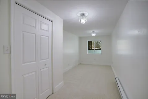 a bathroom with a sink a mirror and shower