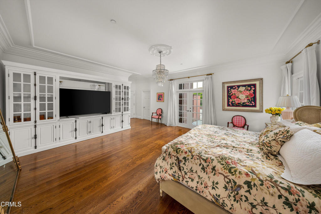 6885 Coyote Canyon Road Somis, CA 93066 - Photo 11 of 35 a bedroom with a bed and a flat screen tv