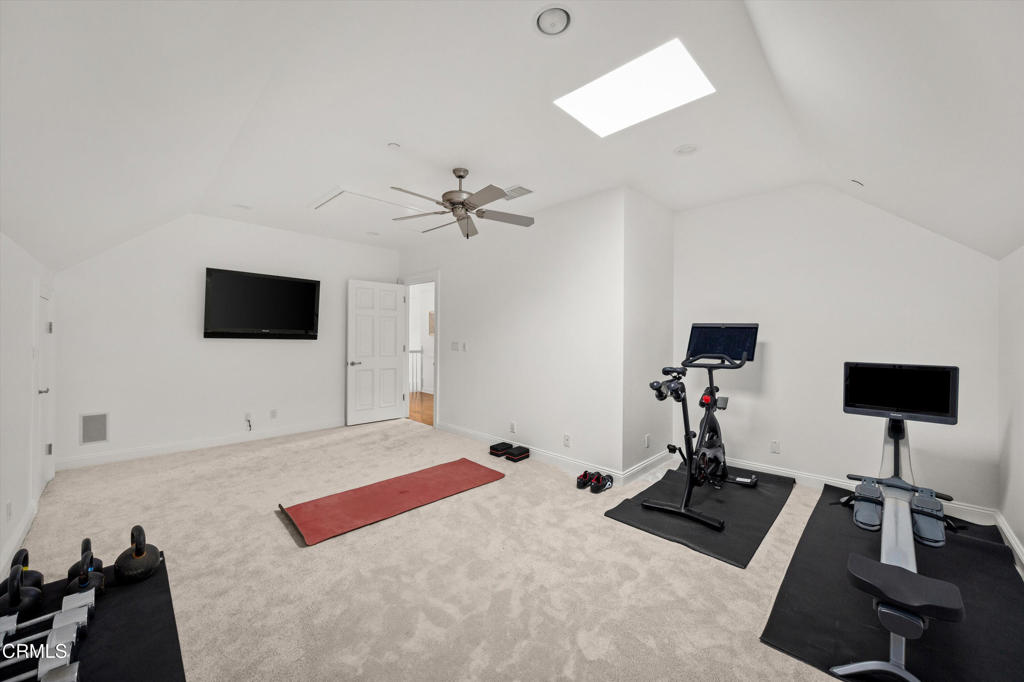 6885 Coyote Canyon Road Somis, CA 93066 - Photo 19 of 35 a living room with furniture and a flat screen tv