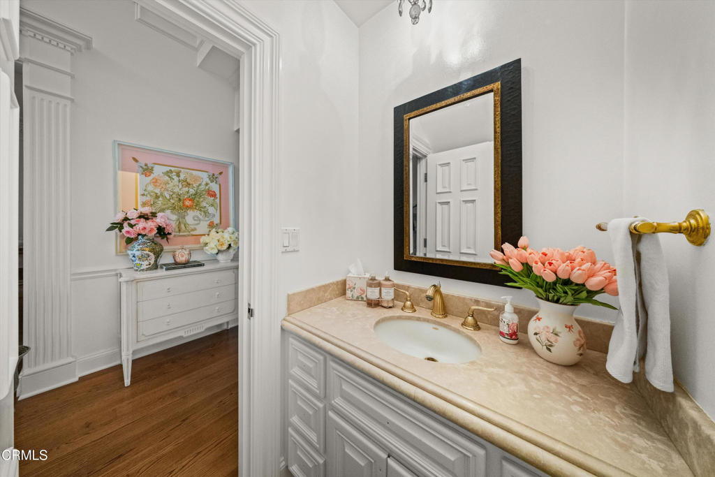 6885 Coyote Canyon Road Somis, CA 93066 - Photo 20 of 35 a bathroom with a sink mirror and vanity