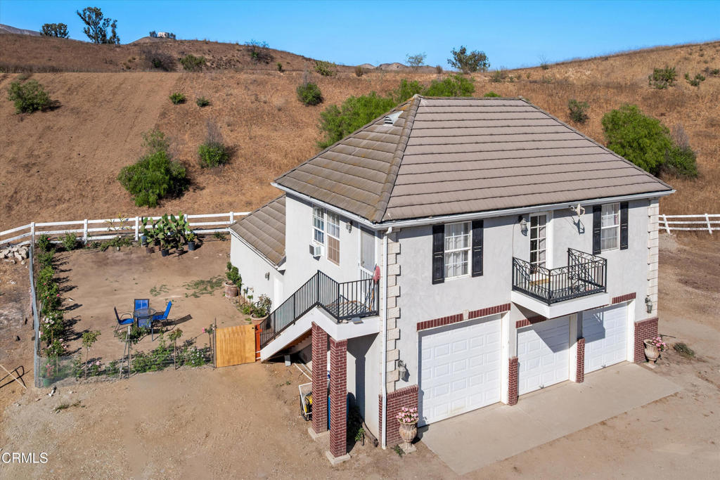 6885 Coyote Canyon Road Somis, CA 93066 - Photo 30 of 35 an aerial view of a house with balcony and patio