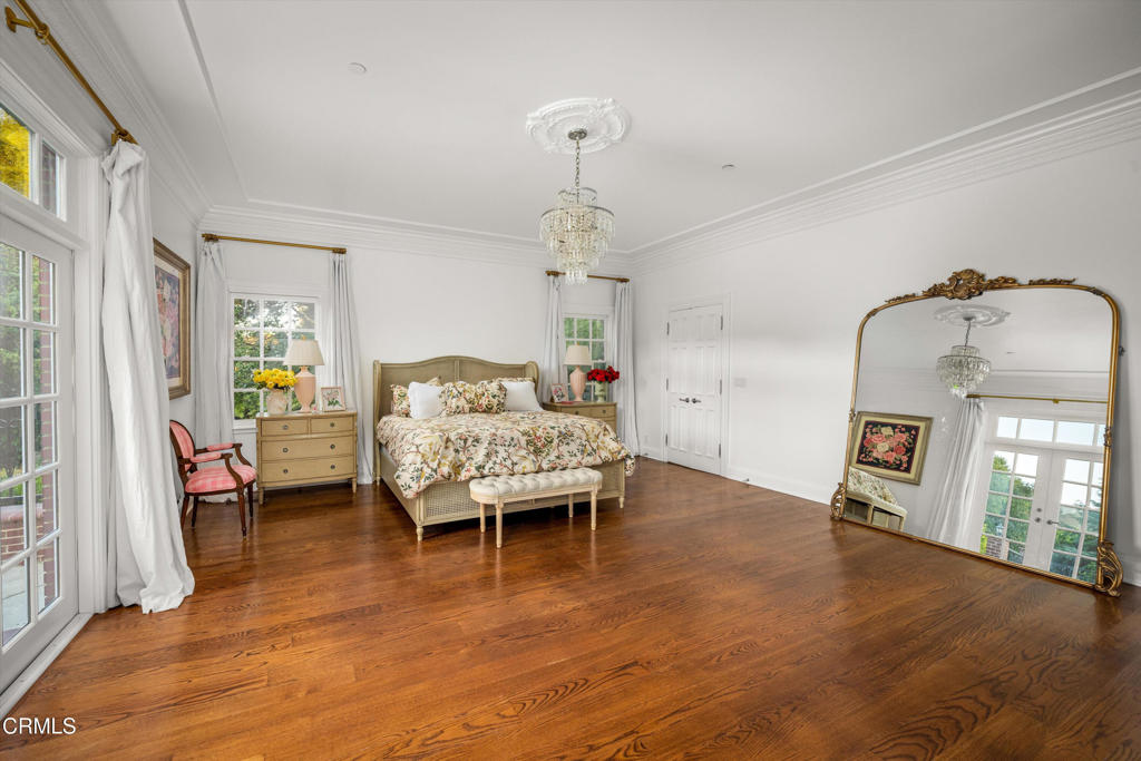 6885 Coyote Canyon Road Somis, CA 93066 - Photo 10 of 35 a living room with furniture and a chandelier