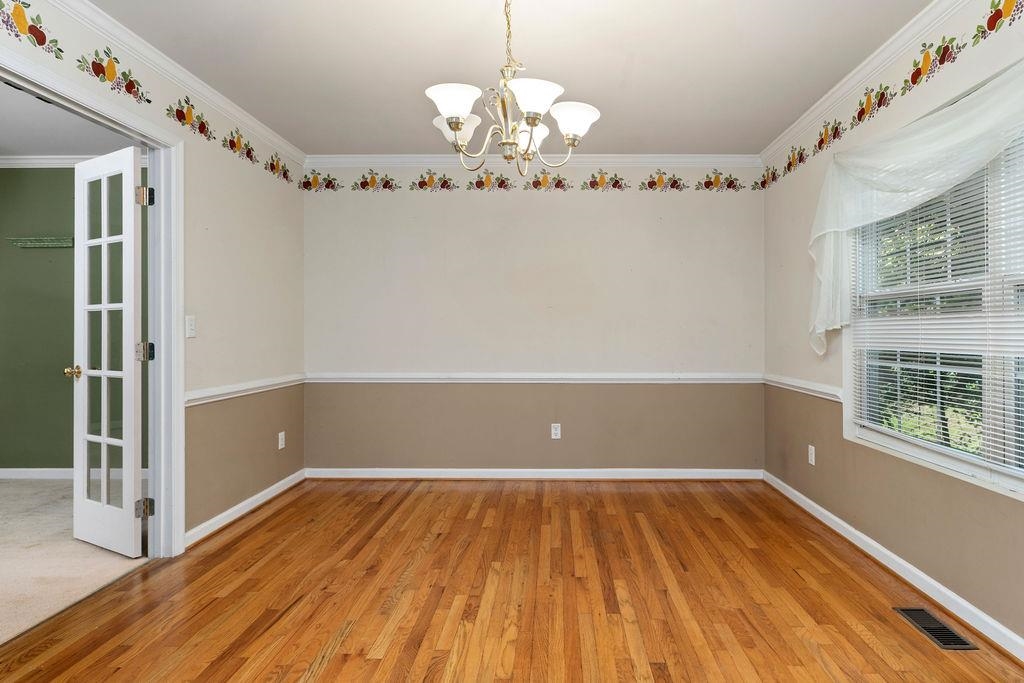 661 Jefferson Drive Palmyra, VA 22963 - Photo 22 of 41 wooden floor in an empty room with a window