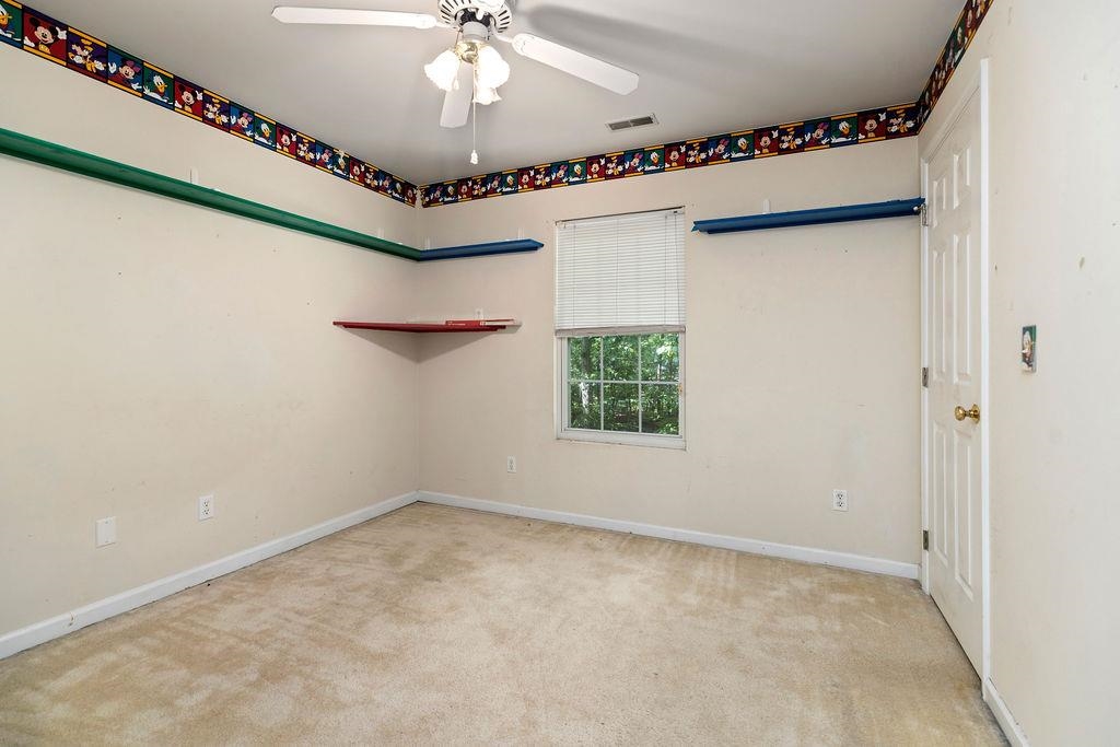 661 Jefferson Drive Palmyra, VA 22963 - Photo 35 of 41 an empty room with windows and fan