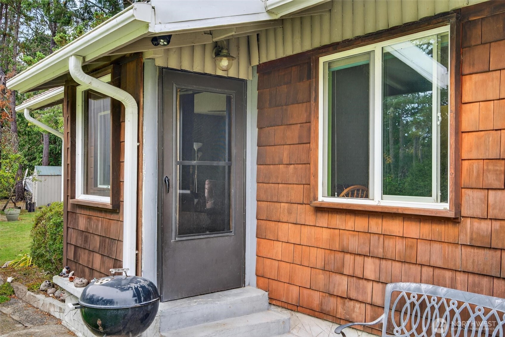 27501 R Lane Ocean Park, WA 98640 - Photo 15 of 40 a front view of a house with a porch