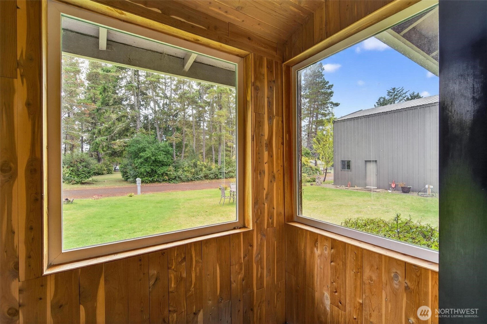 27501 R Lane Ocean Park, WA 98640 - Photo 17 of 40 a view of a porch and backyard
