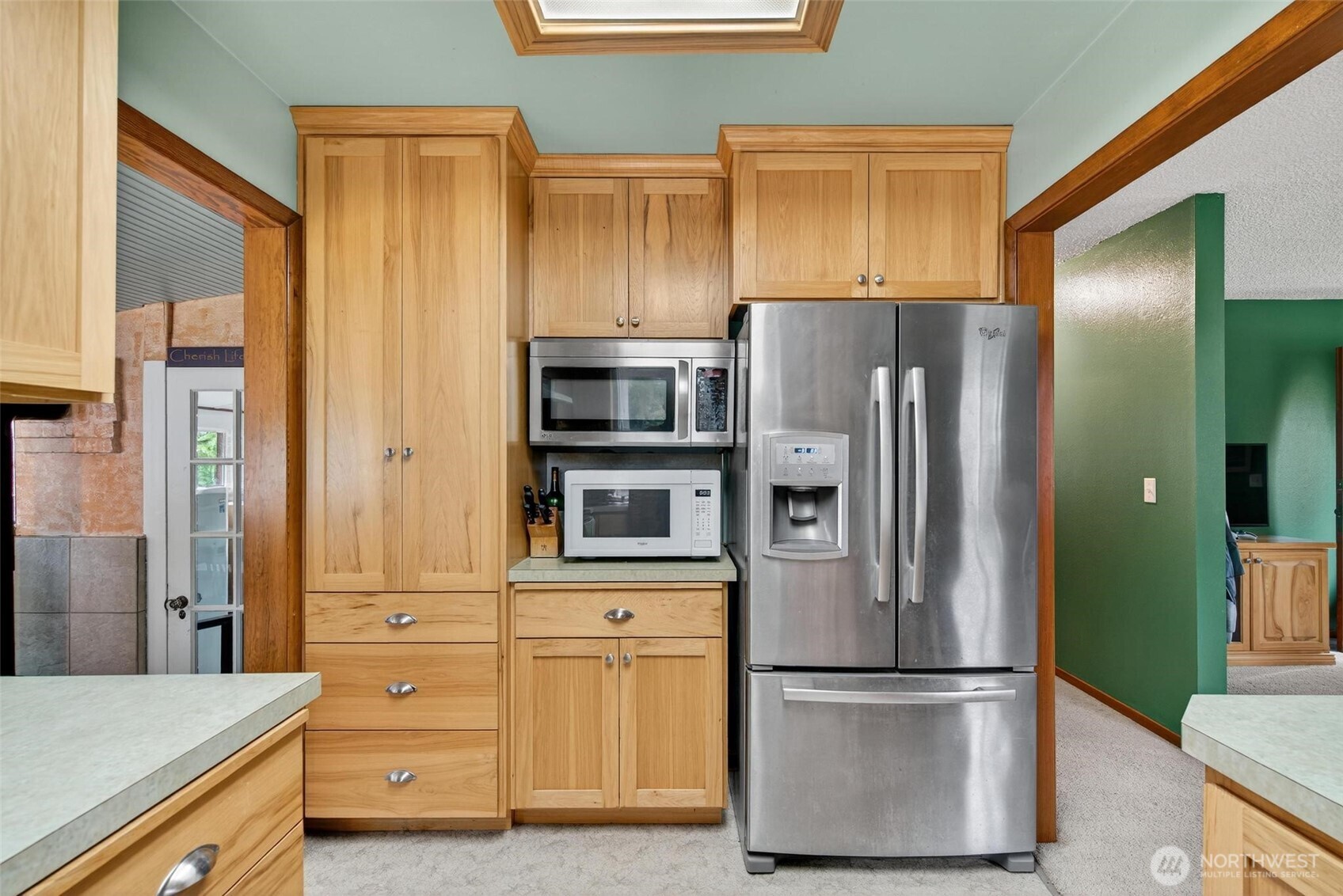 27501 R Lane Ocean Park, WA 98640 - Photo 22 of 40 a kitchen with stainless steel appliances granite countertop a refrigerator and a sink