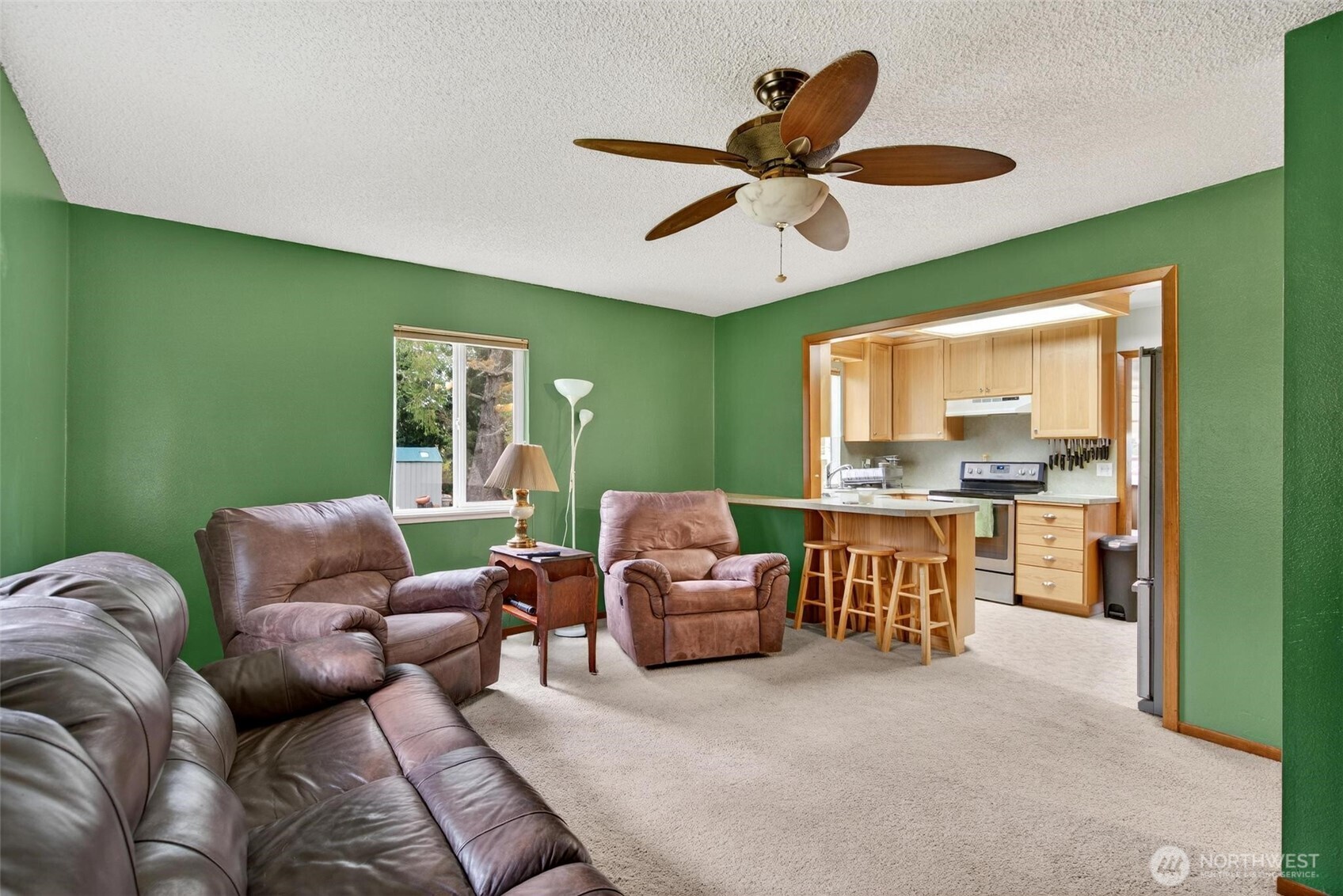 27501 R Lane Ocean Park, WA 98640 - Photo 36 of 40 a living room with furniture and a large window