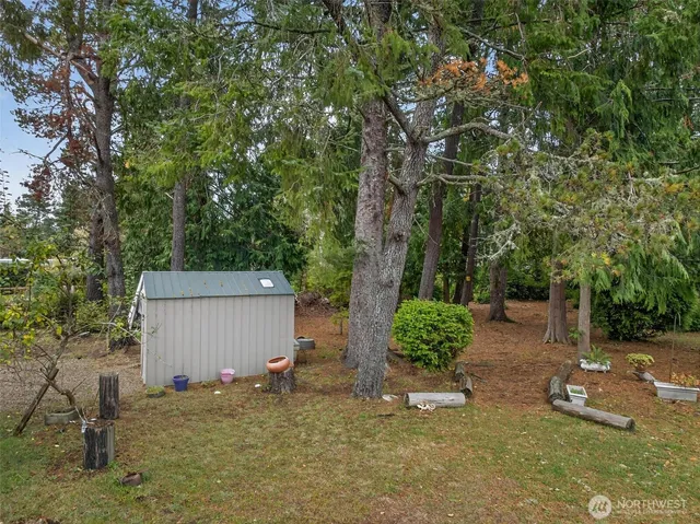 a backyard of a house with lots of green space