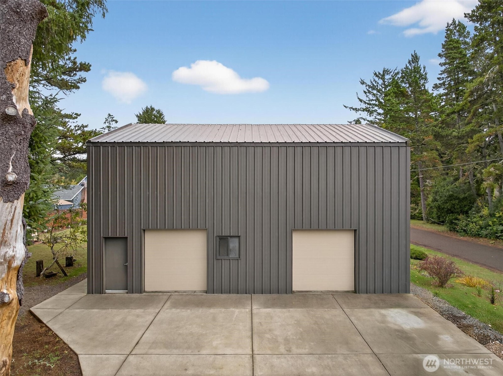 27501 R Lane Ocean Park, WA 98640 - Photo 4 of 40 an outdoor space with sliding door and mountain view
