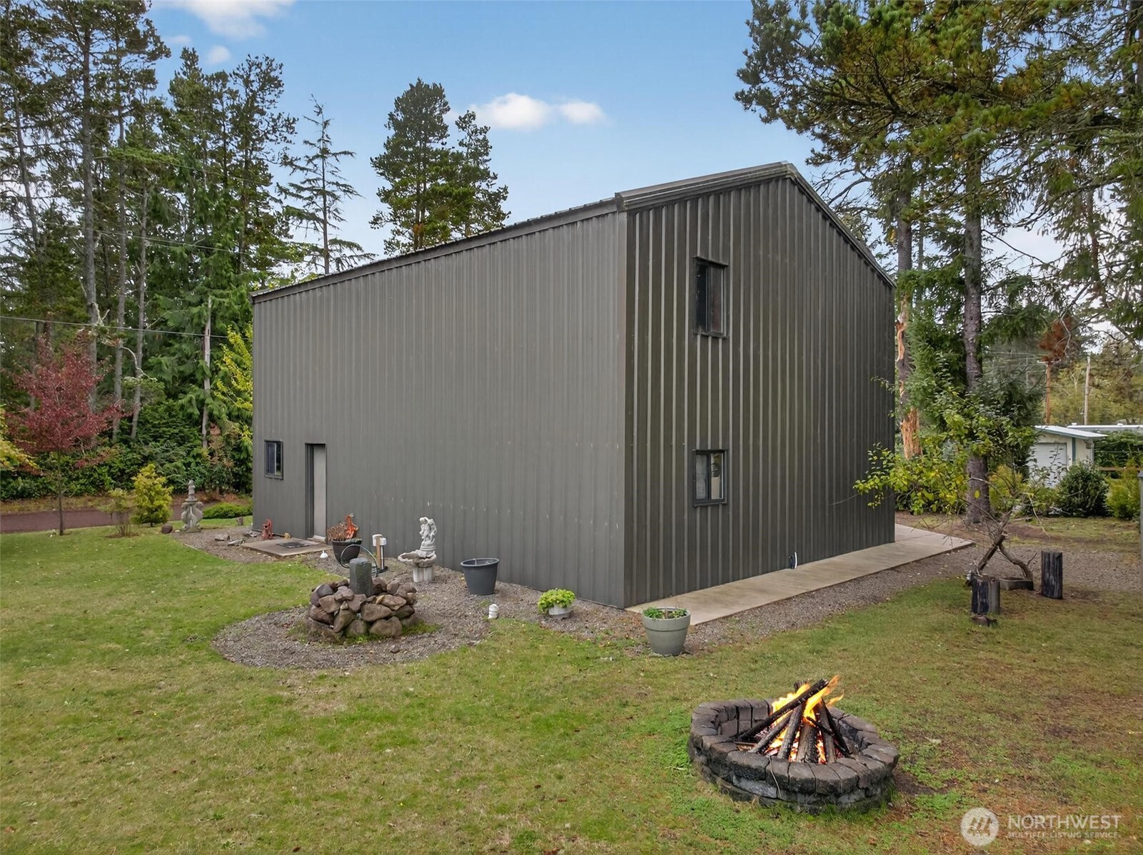 27501 R Lane Ocean Park, WA 98640 - Photo 6 of 40 a backyard of a house with lots of green space