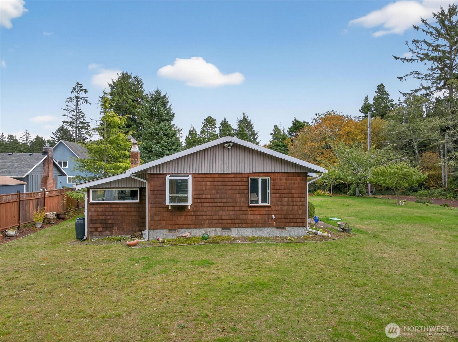 27501 R Lane Ocean Park, WA 98640 - Photo 9 of 40 a front view of a house with garden