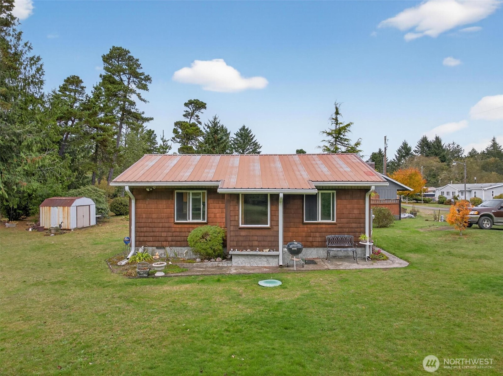 27501 R Lane Ocean Park, WA 98640 - Photo 10 of 40 a front view of a house with a garden
