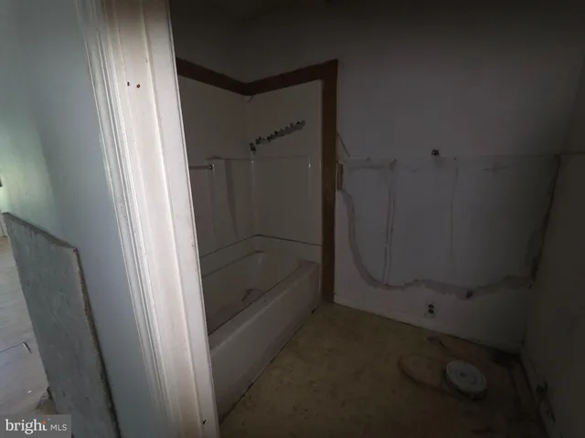 a bathroom with a sink and toilet