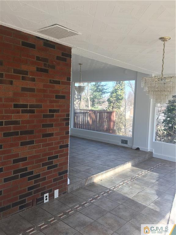 100 Dover Road Colonia, NJ 07067 - Photo 5 of 25 a view of backyard with window