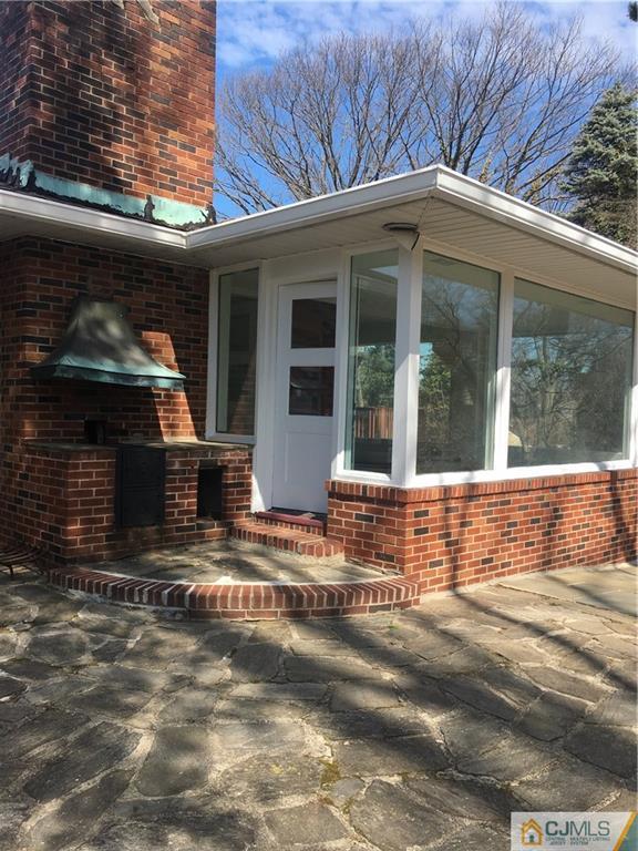 100 Dover Road Colonia, NJ 07067 - Photo 8 of 25 a view of house with outdoor space