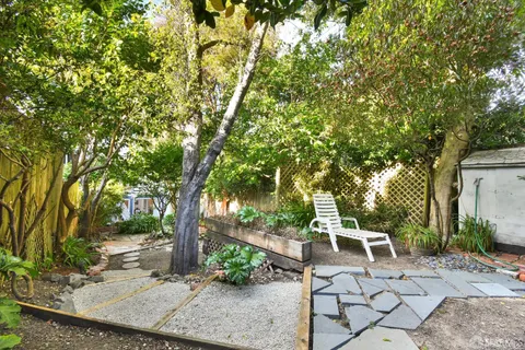 a view of yard with outdoor seating