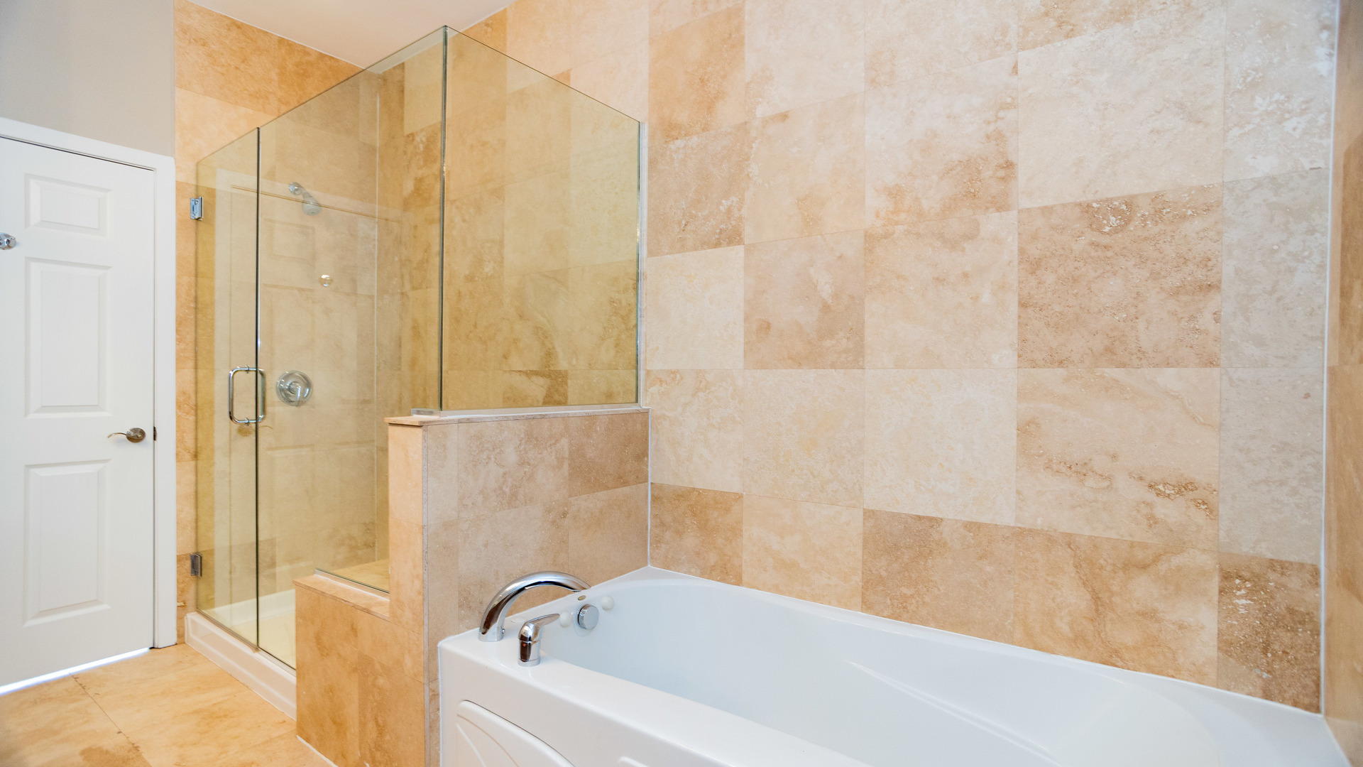 Undisclosed Address Chicago, IL 60645 - Photo 16 of 18 a bathroom with a bathtub and shower