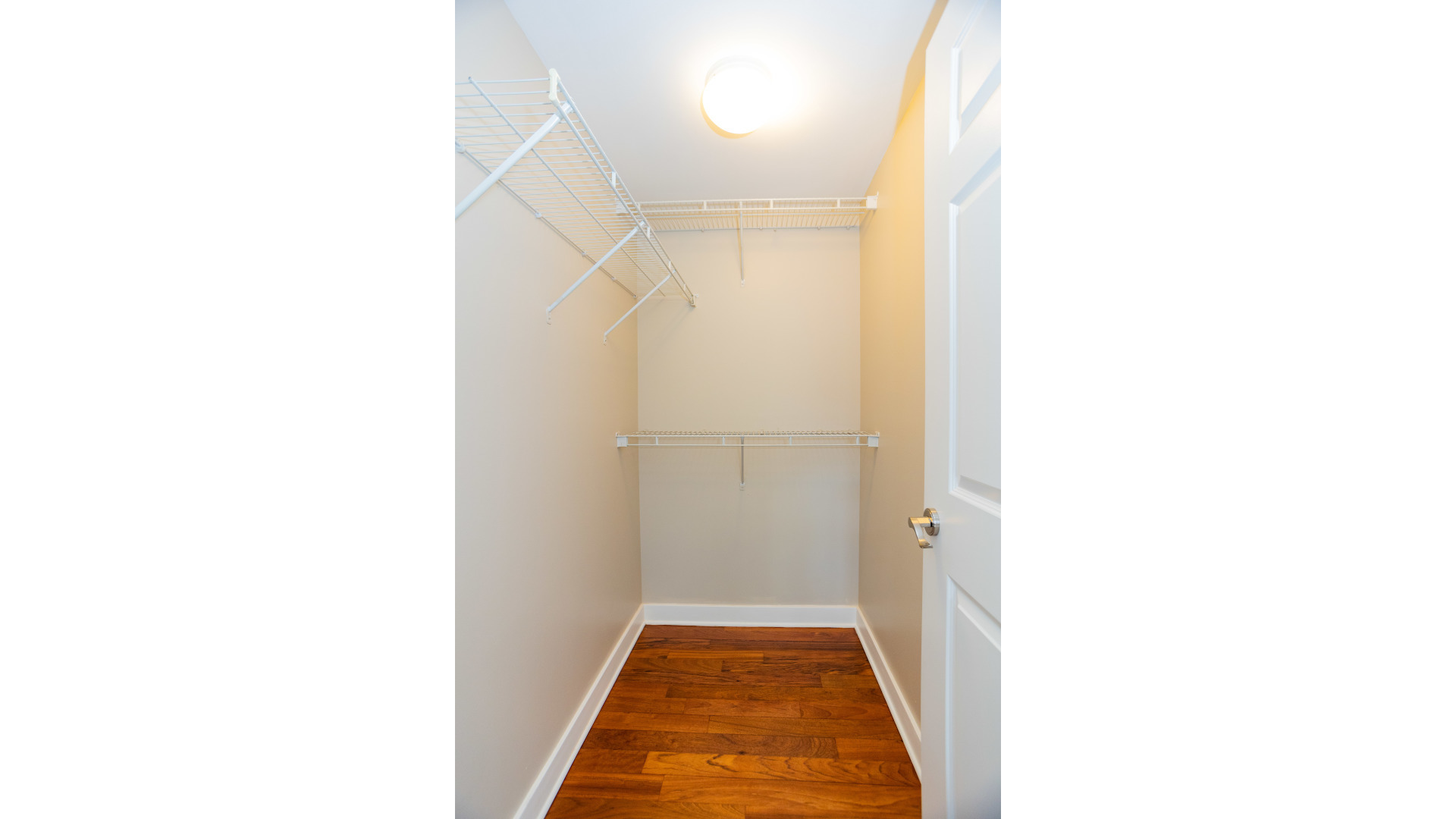 Undisclosed Address Chicago, IL 60645 - Photo 17 of 18 a view of a bathroom with white door