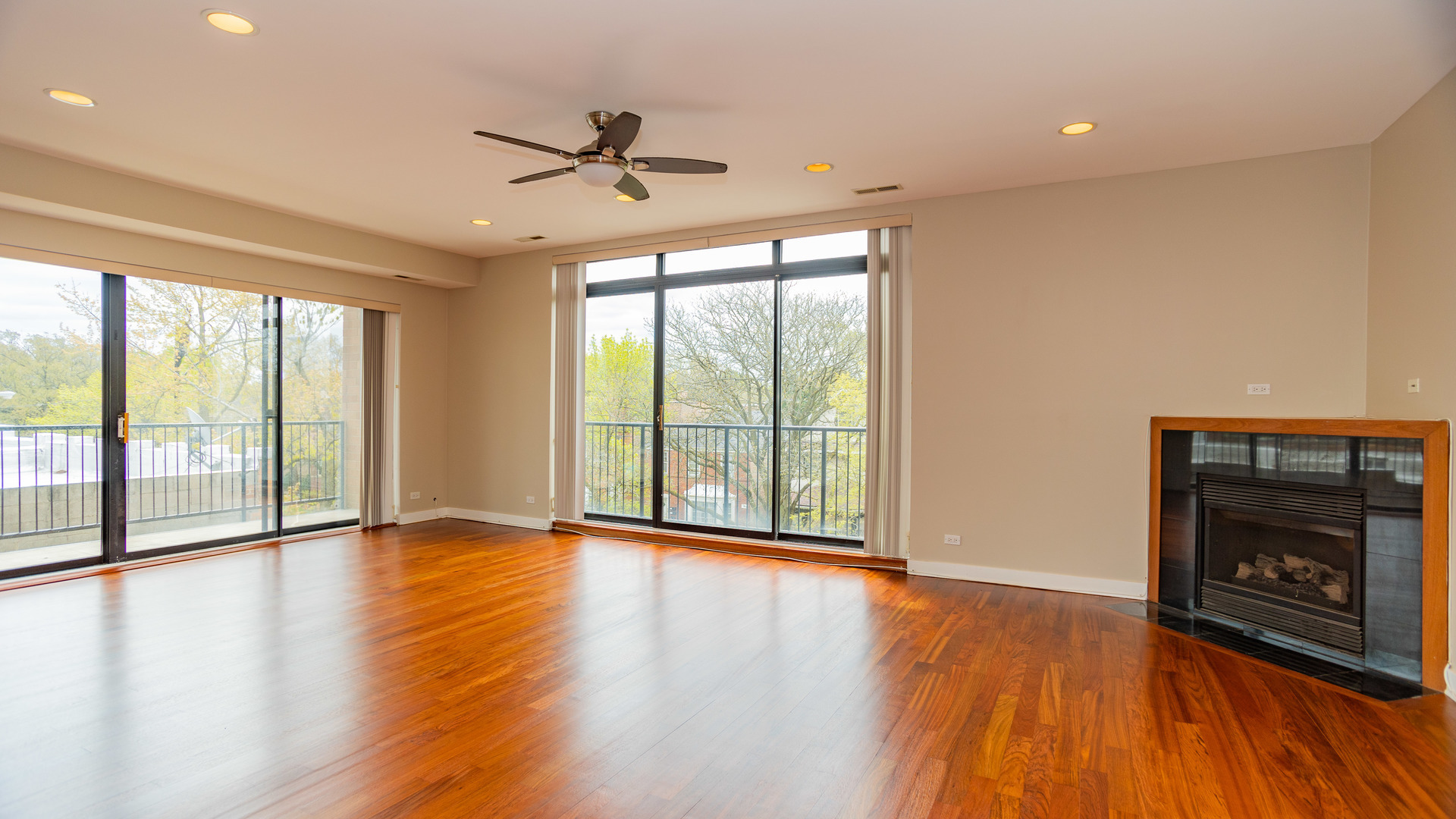 Undisclosed Address Chicago, IL 60645 - Photo 4 of 18 a view of an empty room with wooden floor and a window