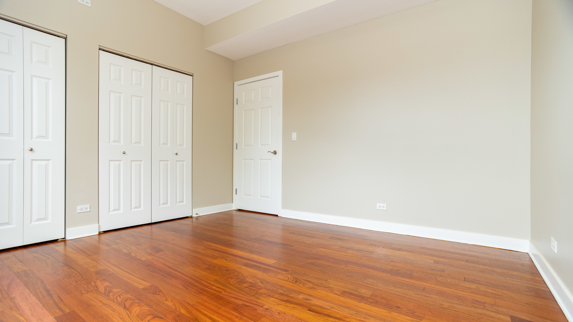 Undisclosed Address Chicago, IL 60645 - Photo 9 of 18 a view of an empty room with wooden floor