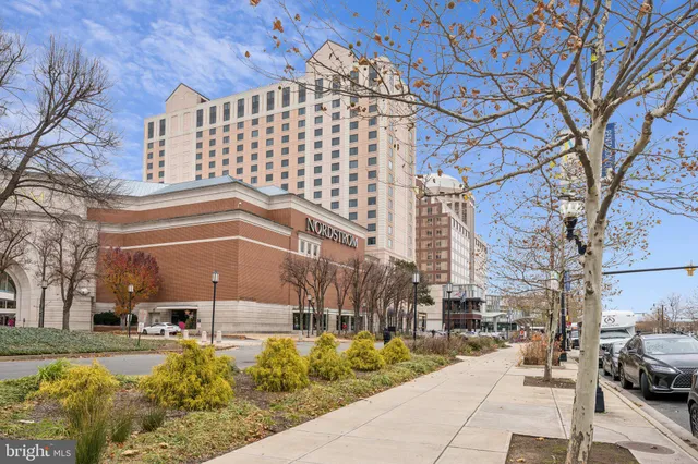 a view of city with tall buildings
