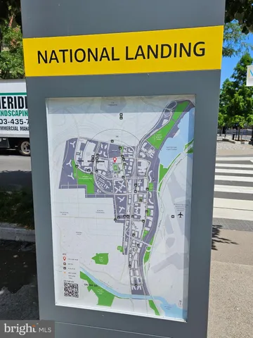 a view of a living room with a large window