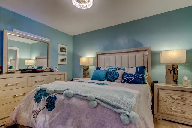 a bathroom with a sink a toilet and shower curtain