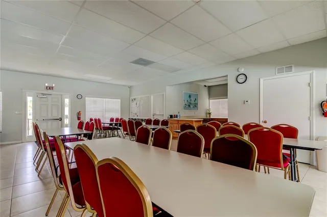 a kitchen with refrigerator and window