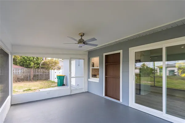 a view of an empty room and window