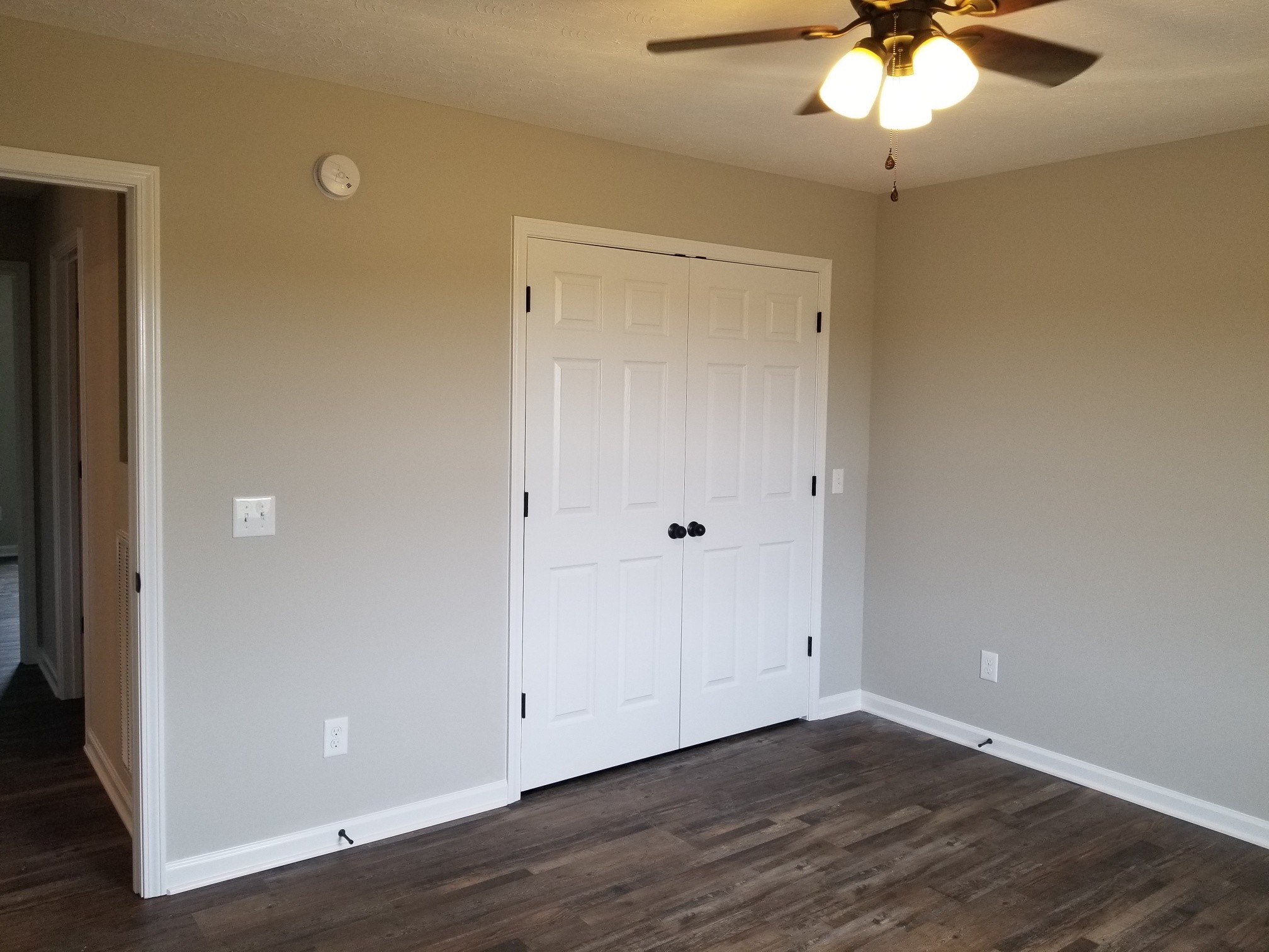 2145 Austin Road Lafayette, TN 37083 - Photo 15 of 21 a view of an empty room with wooden floor