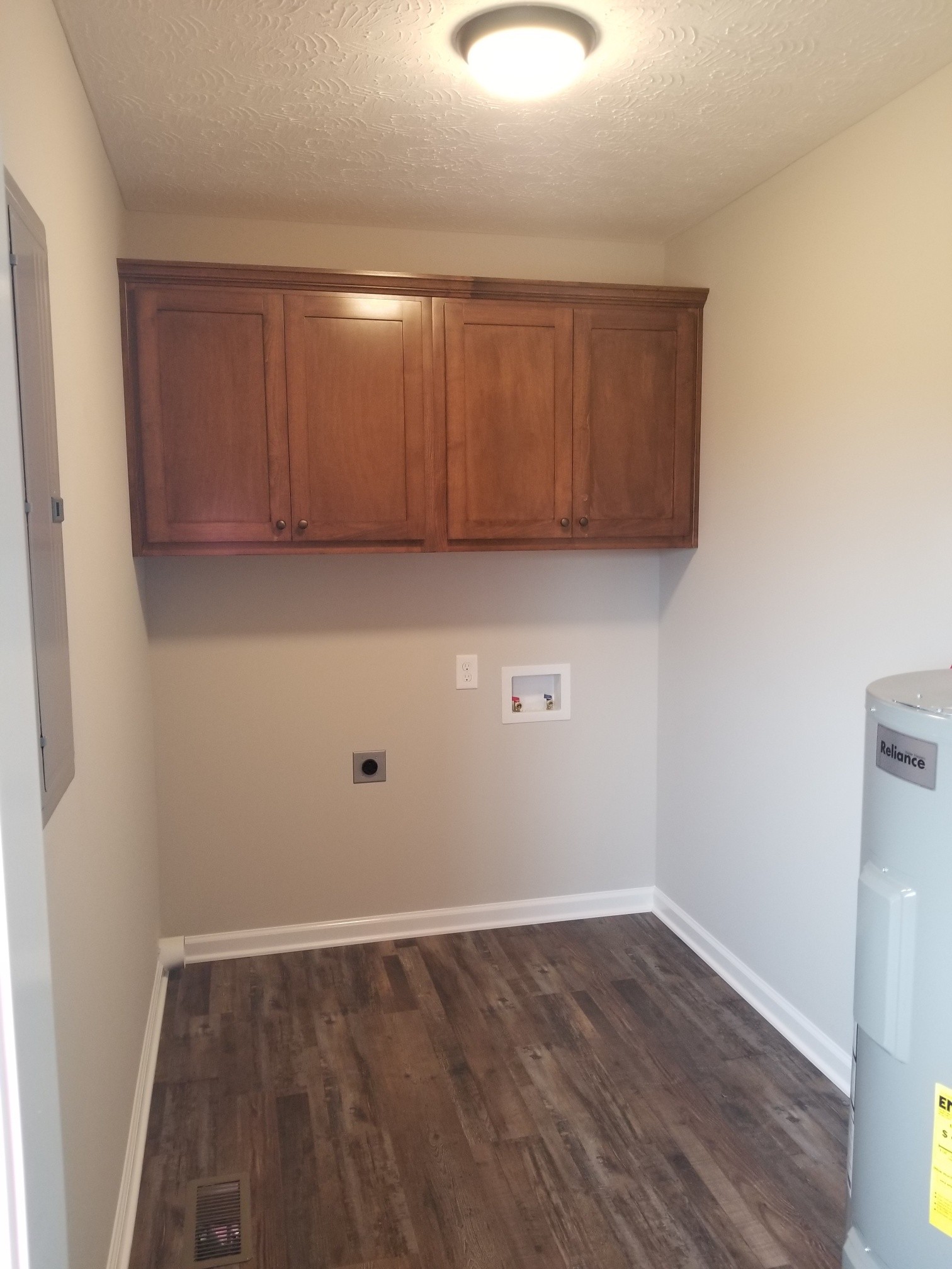 2145 Austin Road Lafayette, TN 37083 - Photo 19 of 21 a view of an empty room with wooden floor and a window