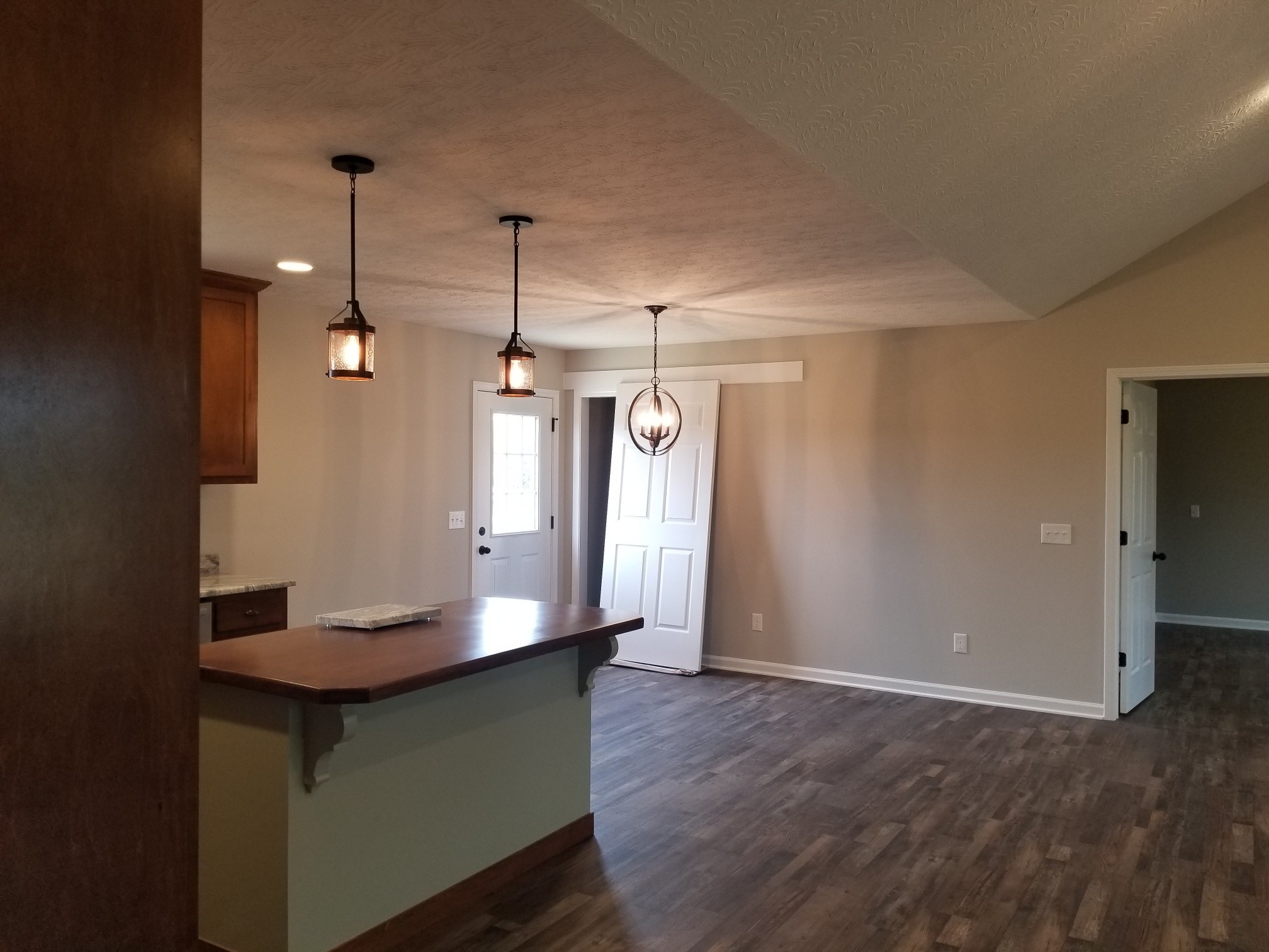 2145 Austin Road Lafayette, TN 37083 - Photo 4 of 21 a view of a room with wooden floor and staircase