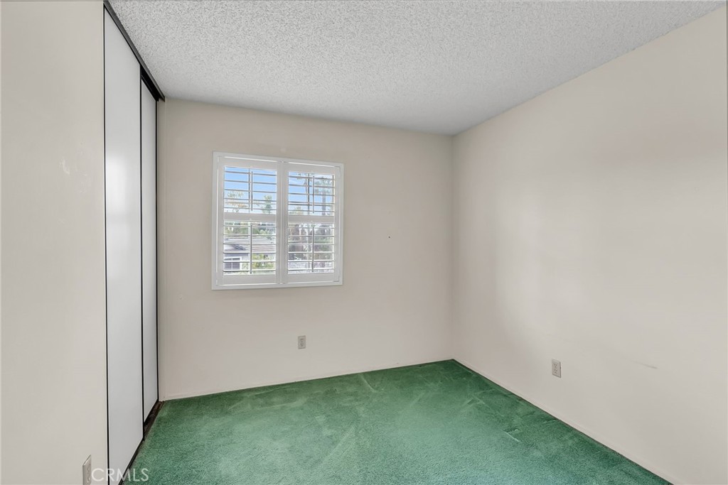 2892 Jackson Street Riverside, CA 92503 - Photo 19 of 29 an empty room with a window