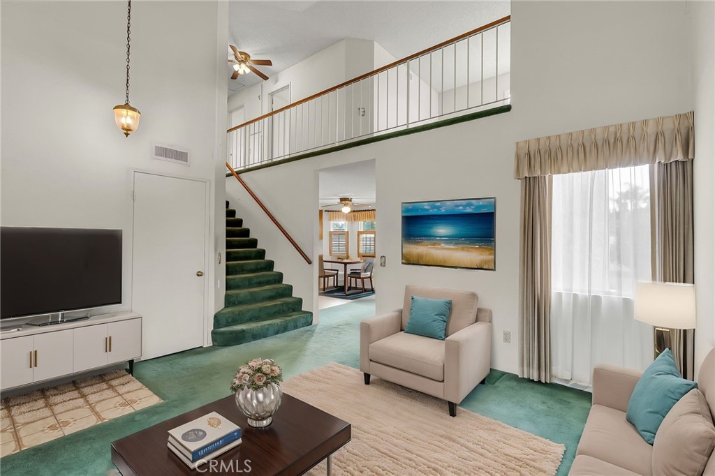 2892 Jackson Street Riverside, CA 92503 - Photo 5 of 29 a living room with furniture and a flat screen tv