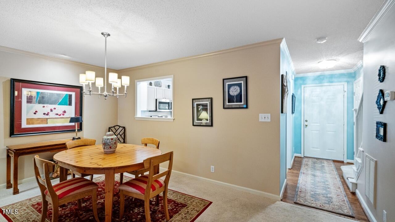 4423 Antique Lane Raleigh, NC 27616 - Photo 10 of 33 10 dining and door