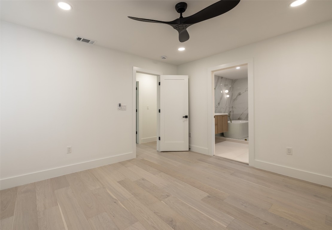 1206 Cloverleaf Drive Austin, TX 78723 - Photo 12 of 22 an empty room with a bathroom