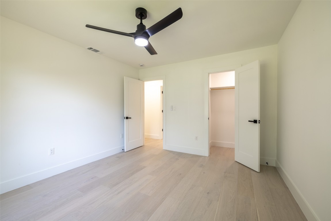 1206 Cloverleaf Drive Austin, TX 78723 - Photo 16 of 22 wooden floor in an empty room